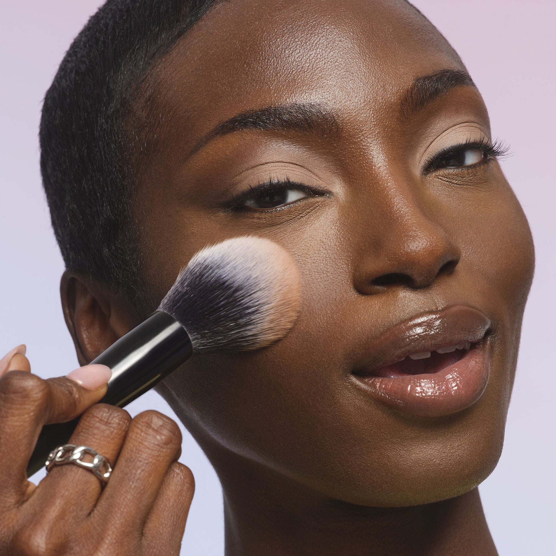 Apply Set it Bright Powder with Pointed Powder Brush